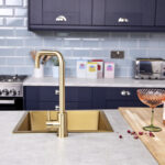 flöde Dellen | Single Lever Kitchen Sink Mixer Tap with Swivel Spout | Square Neck Design | Brushed Brass Finish